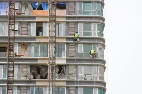 Worker scaffolding on the side of the building Stock Photos