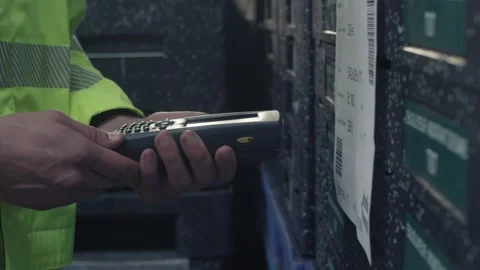 Worker Scanning Barcode Label On Stacked Crates, Warehouse Aisle, Detail Shot Stock Footage 341304331