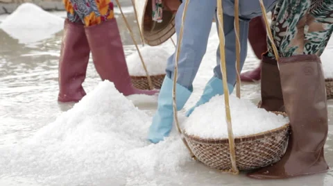 Worker Scoop Salt into Baskets Stock Footage 42396249