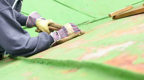 Worker Scraping off Green Paint Stock Footage 64080411