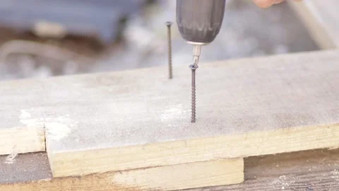 A worker screws up the screws with a screwdriver, close-up Stock-Footage 161097675