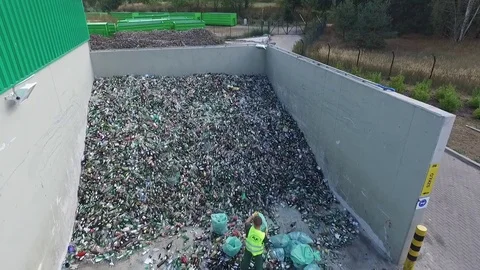 A worker segregates bottles, a rubbish dump, aerial view Stock Footage 85290992