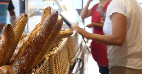 Worker serving bakery customers dispatched friendly staff baker counter shop 4k Stock-Footage 84087919
