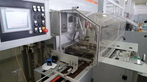 Worker sets the program on the display. Production line for the production of Stock Footage 74202560