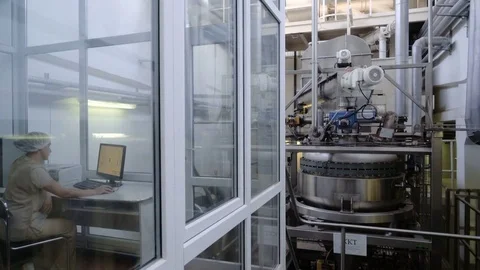 Worker sets the program on the display. Production line for the production of Stock Footage 74203208