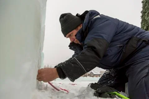 Worker sets the spotlight in the ice figure 스톡 사진