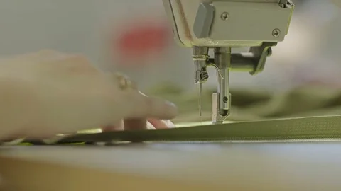 Worker Sewing A Zipper Into A Textile Stock Footage 69855412