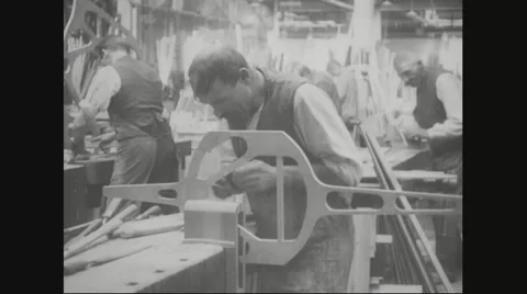 Worker shaping the aircraft wing fillet Stock Footage 43311400