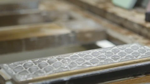 Worker sharpening his tool on the slab Stock Footage 87837340