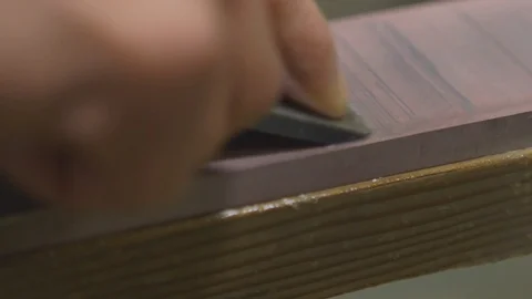 Worker sharpening his tools on the slab Stock Footage 87800862