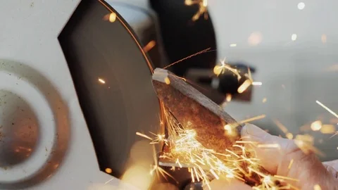 Worker Sharpening Tools By Grinding Wheel Stock Footage 79029488