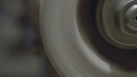 The worker sharpens the tool. Work on a sharpening machine. Stock Footage 81698032