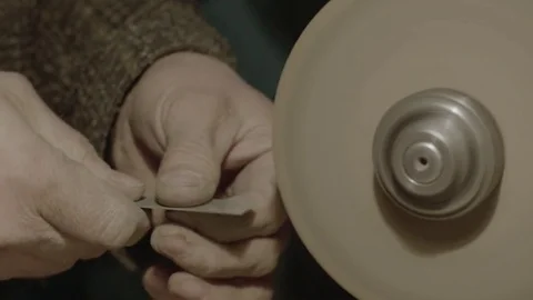 The worker sharpens the tool. Work on a sharpening machine. Stock Footage 81698877