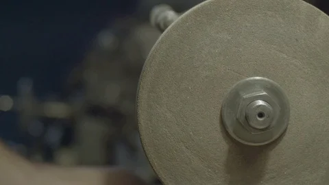 The worker sharpens the tool. Work on a sharpening machine. Stock Footage 81698879