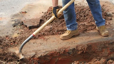 Worker Shoveling Stock Footage 890152