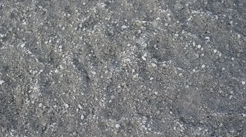 A worker shoveling sand Stock Footage 42644716