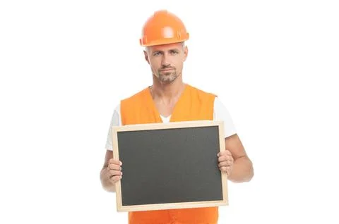Worker showing advertisement in white studio. worker show advertisement on Stock Photos