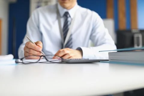Worker sitting at workplace Stock Photos