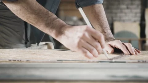 Worker sketching on wood Stock Footage 149293539