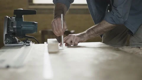 Worker sketching on wood Stock Footage 149293687