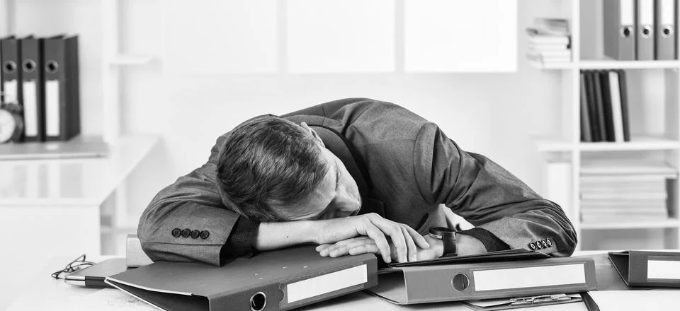 Worker sleep on documents folders workplace, overwork problem concept Stock Photos