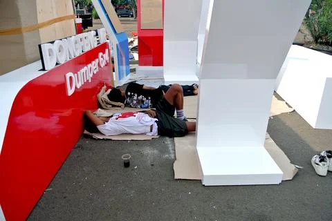 The worker is sleeping at construction site Stock Photos