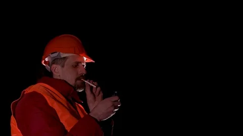 Worker smoking a cigarette when resting Stock Footage 72528559