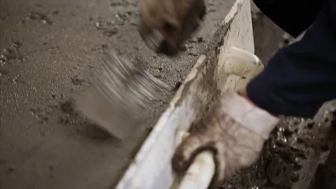 Worker Smoothing Concrete. Construction work site. Builder at work. Stock Footage 70208185