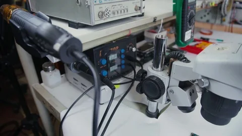 Worker soldering components to printed circuit board Video stock 70052612