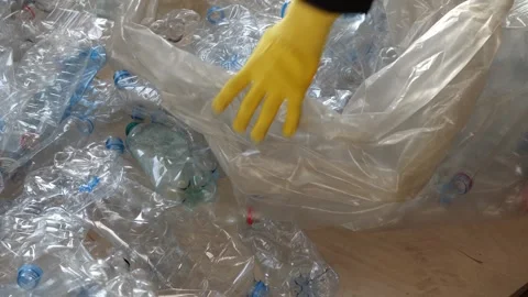 Worker Sorting Plastic Bottles by Hand Stock Footage 315996699