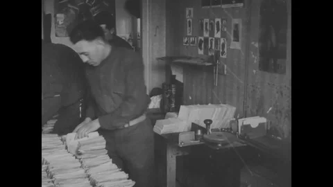 Worker sorts a mail and stamp mail after censorship - 1918 Stock Footage 98957967