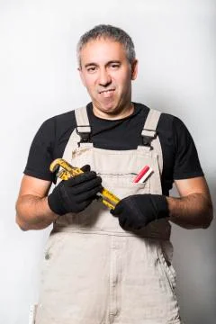 Worker specialist plumber, engineer or constructor on white background Stock Photos