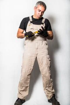 Worker specialist plumber, engineer or constructor on white background Stock Photos