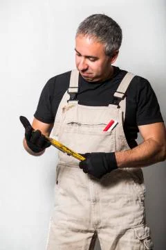 Worker specialist plumber, engineer or constructor on white background Stock Photos
