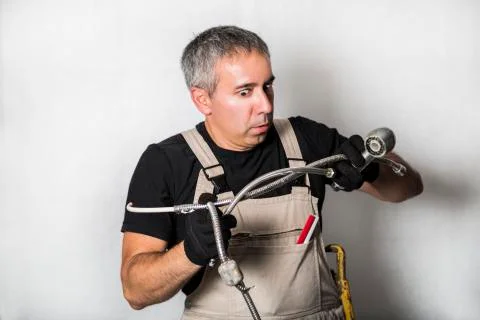 Worker specialist plumber, engineer or constructor on white background Stock Photos