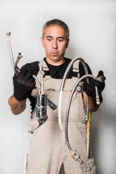 Worker specialist plumber, engineer or constructor on white background Stock Photos