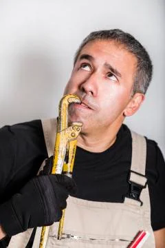 Worker specialist plumber, engineer or constructor with wrench Foto stock