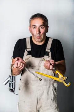 Worker specialist plumber, engineer or constructor on white background Stock Photos