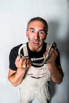 Worker specialist plumber, engineer or constructor on white background Stock Photos