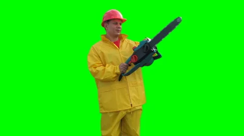 Worker spins with chainsaw on the Green Screen LOOP Full HD Stock Footage 1059432