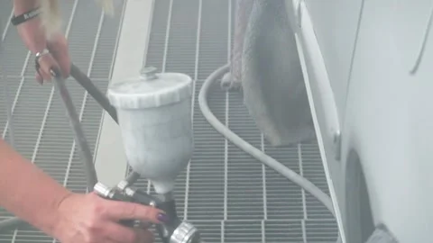 Worker Spray Painting Surface With Spray Gun In Workshop 스톡 동영상 332058252