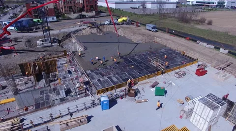 Worker spraying concrete on construction site Stock Footage 64130419