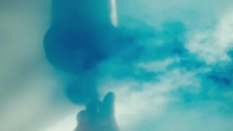 Worker Spraying Glass Panel with Blue Paint Stock Footage 321691623