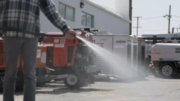 Worker Spraying Off Hazardous Materials Stock Footage 85637741