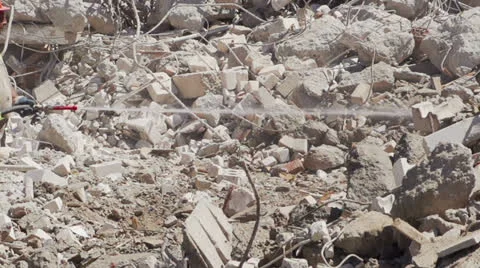 Worker sprays water at construction site Video stock 24741573