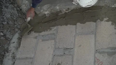 Worker Spreading Cement Stock Footage 167266455