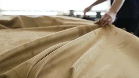 Worker spreads material in factory Video stock 183459194