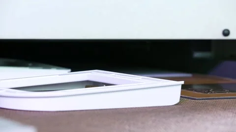 Worker stacks plastic and glass pieces on a conveyor belt Stock Footage 162902007