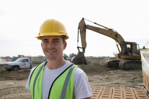 Worker Standing At Construction Site Foto stock