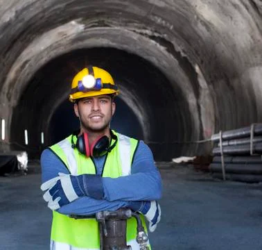 Worker standing in tunnel Stock Photos